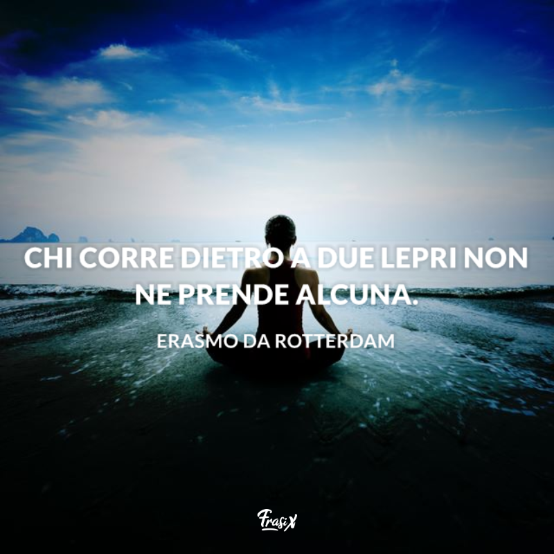 Uomo medita davanti un lago