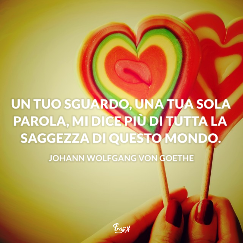 Immagine con lecca lecca a forma di cuore e frase dolce