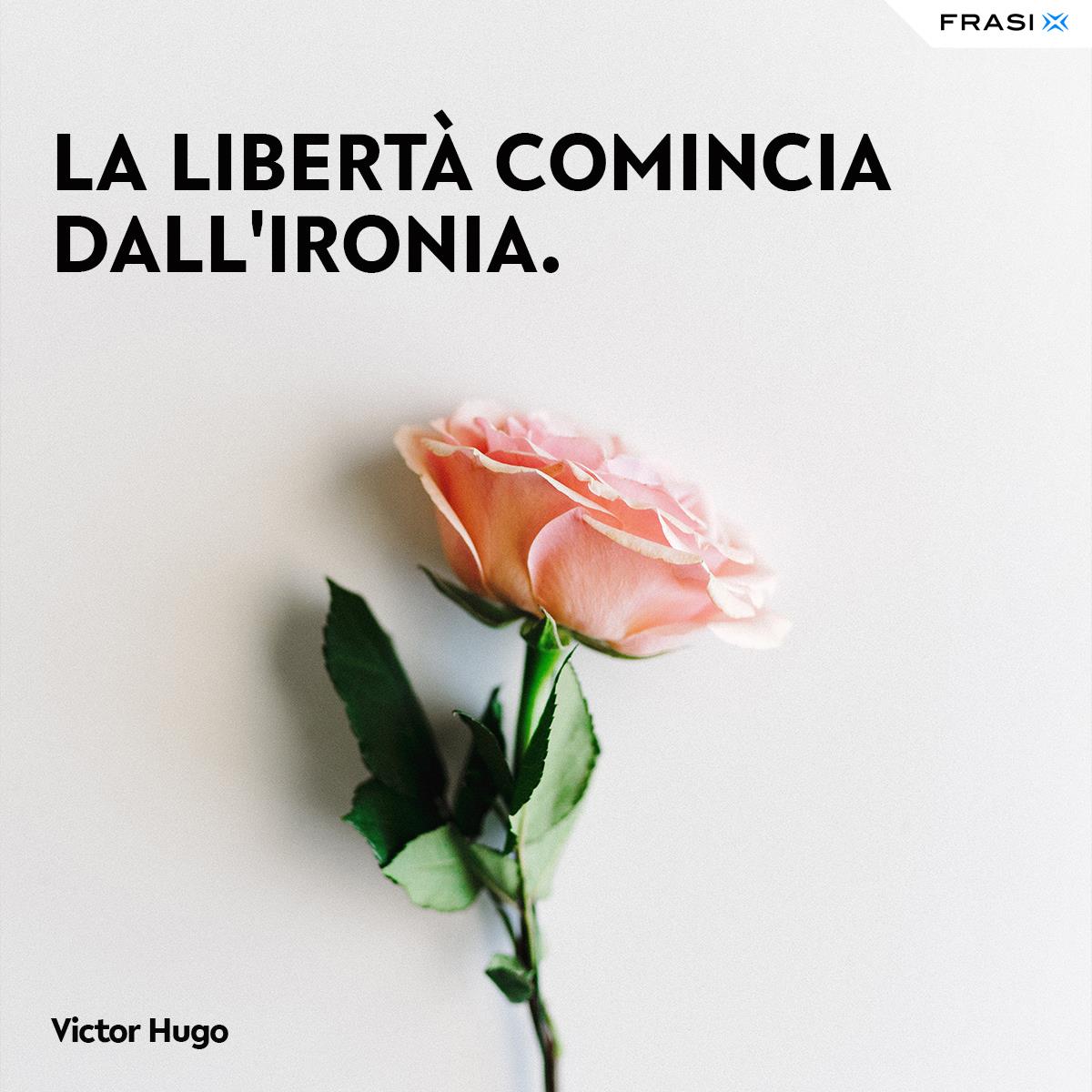 Immagine rosa con frasi libertà Victor Hugo