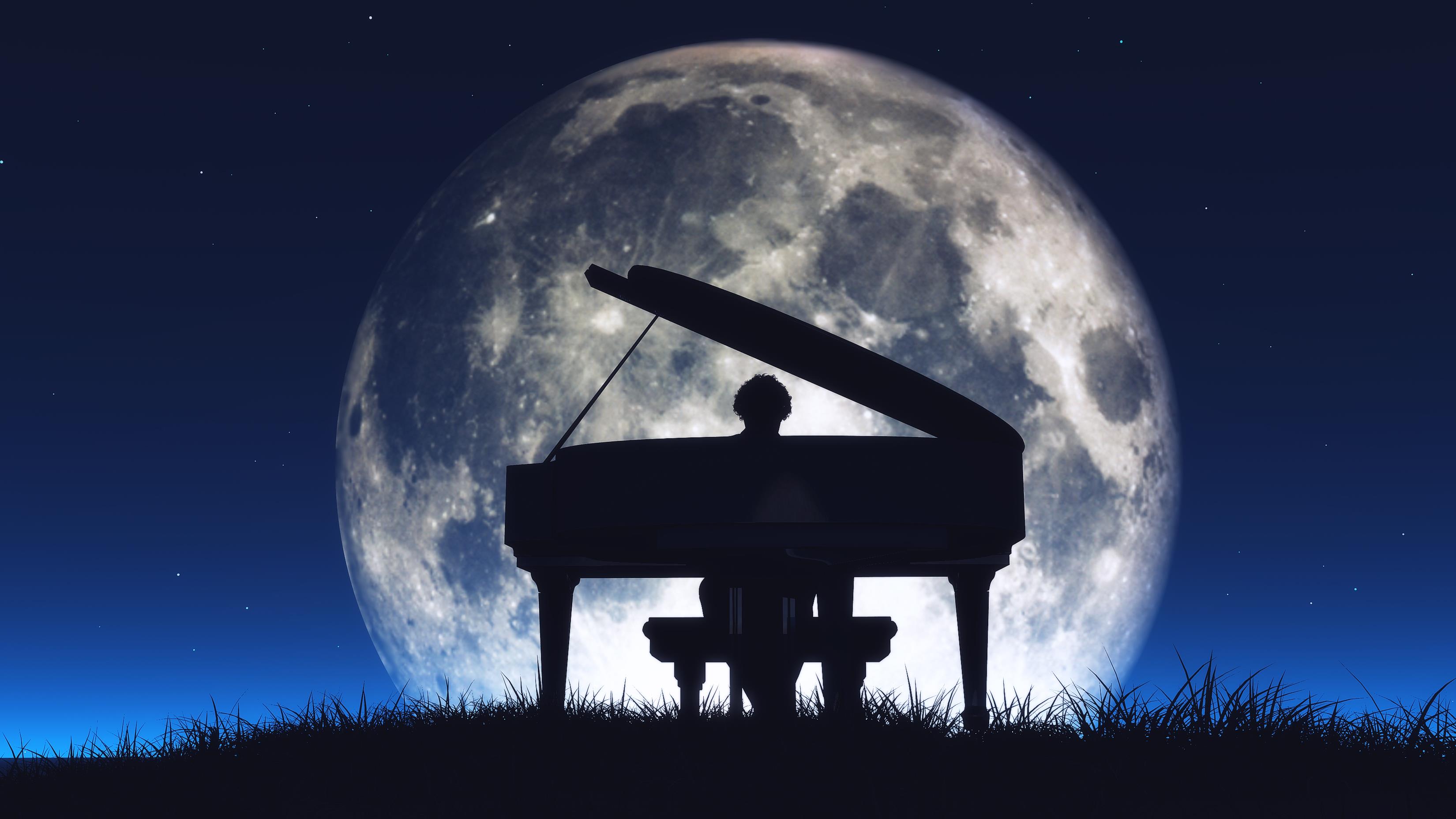 Pianista suona di notte in un prato sovrastato dalla luna