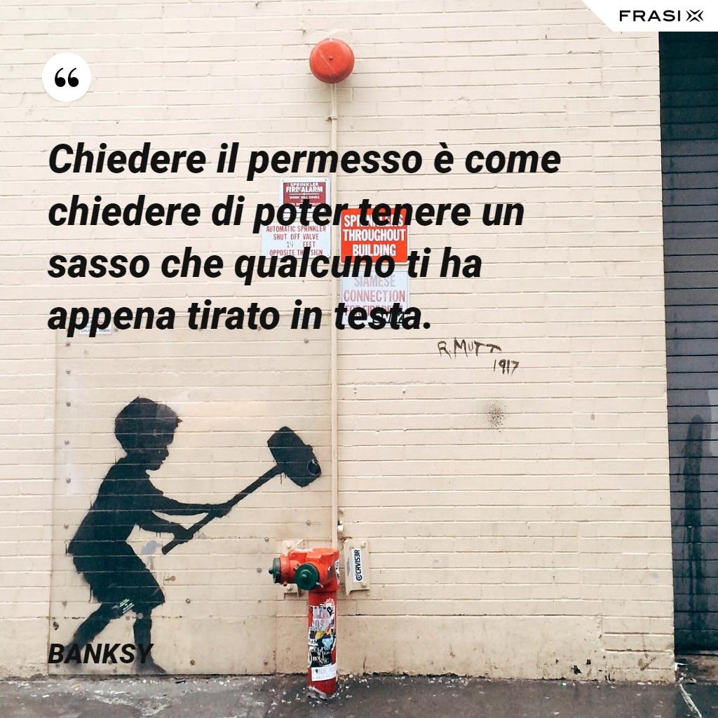 Immagine con frasi di Banksy